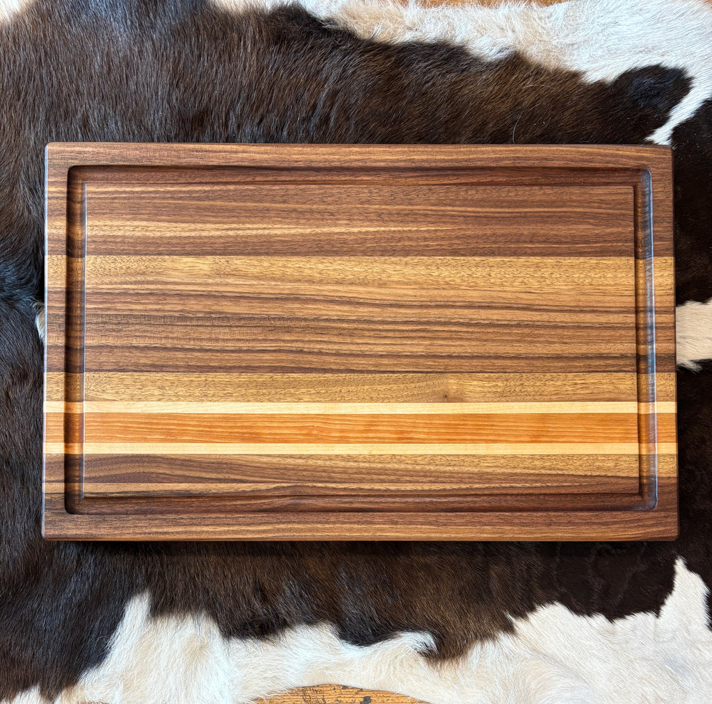 Walnut, maple, cherry striped cutting board