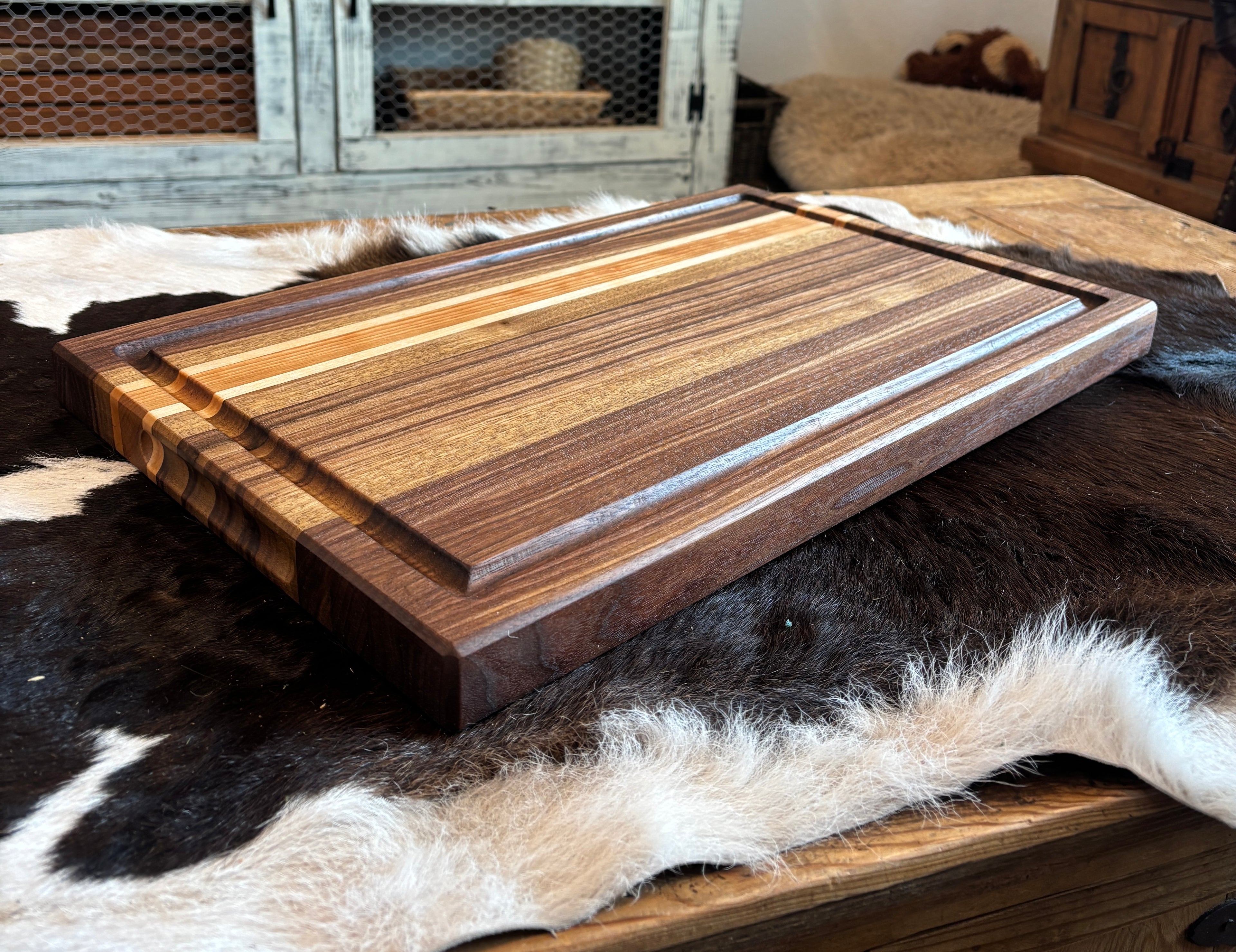 Walnut, maple, cherry striped cutting board