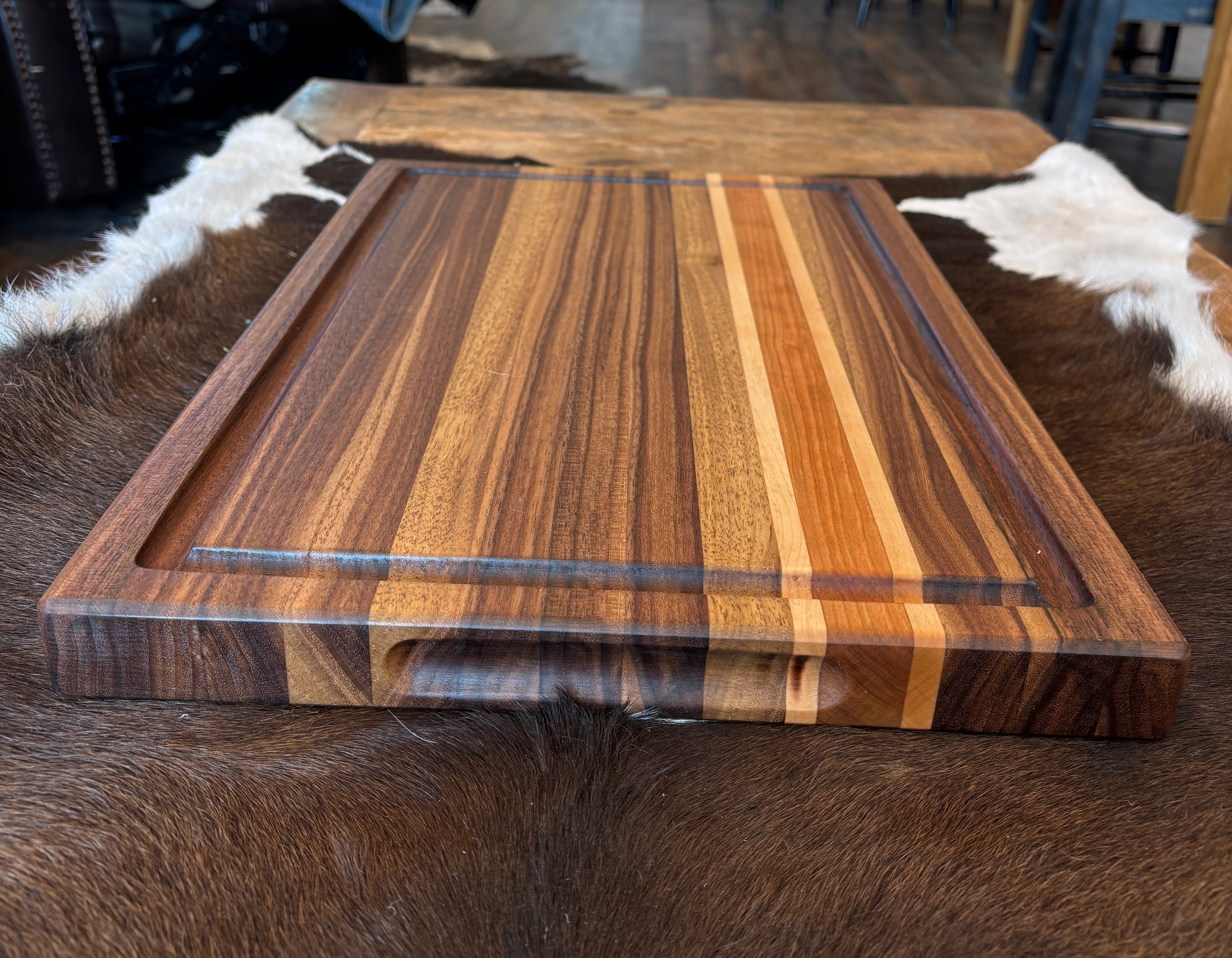 Walnut, maple, cherry striped cutting board
